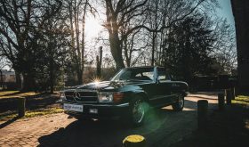 560 SL  in Schwarz 040 mit Leder, Dach Schwarz