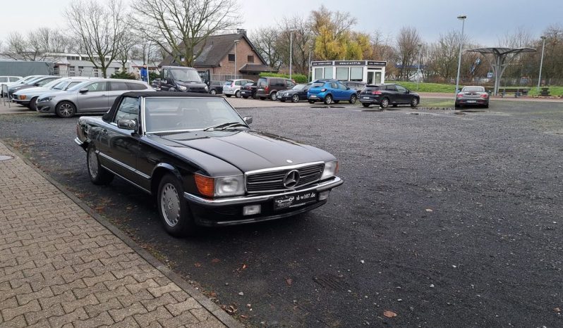 
								Mercedes-Benz SL 560 Schwarz Uni / Leder Mittelrot voll									